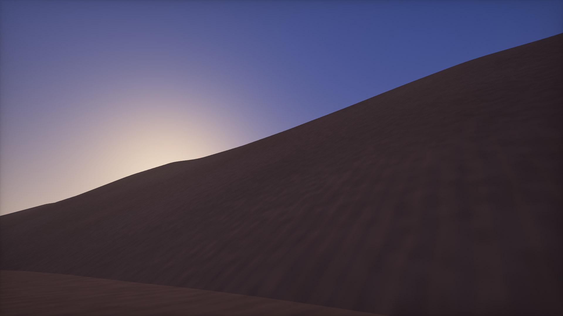 The knife-edge crest of a great dune against the sky, sand streaming off it in the wind.